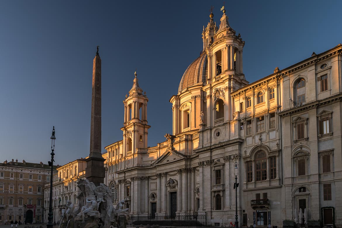This is the facade of one of the main buildings in Piazza Navona, illuminated by the first light of day.