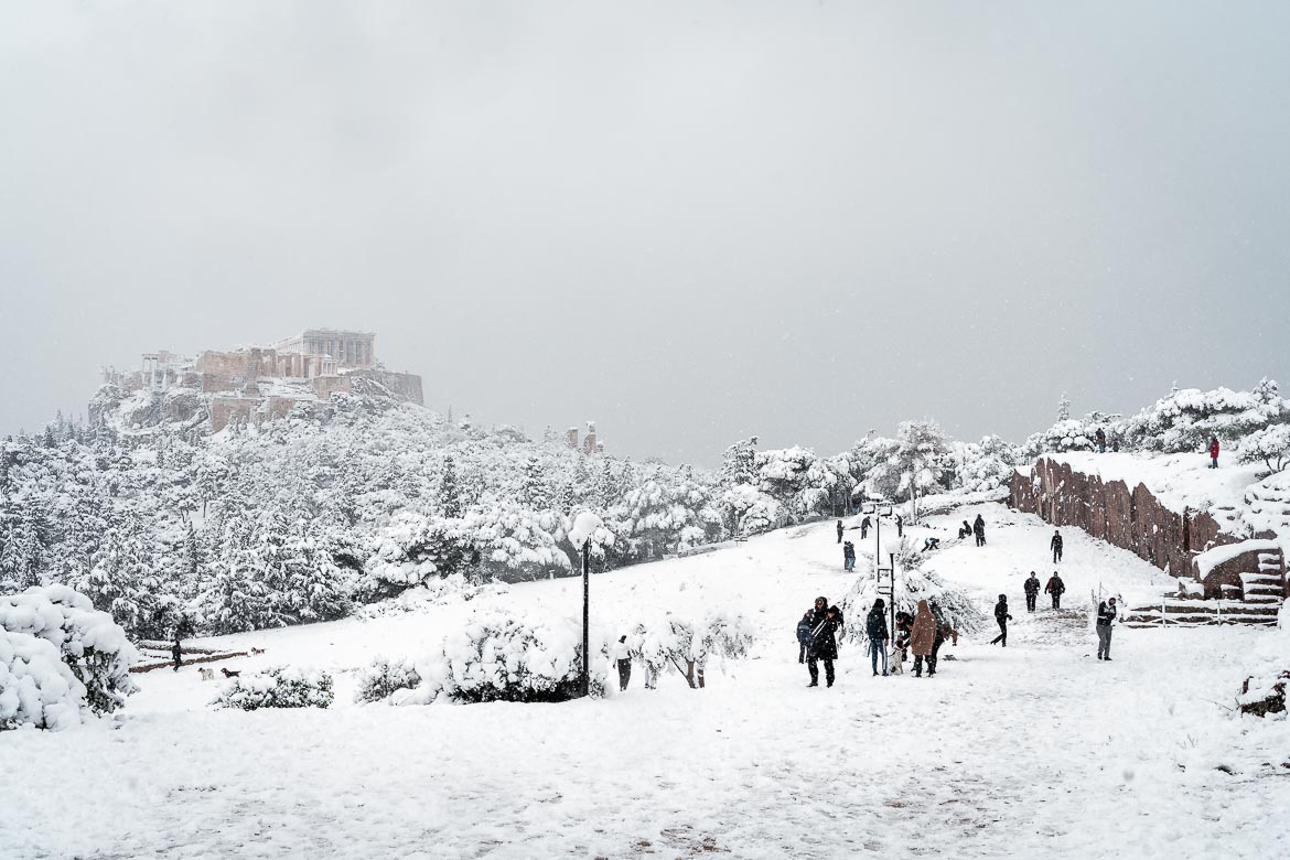 This image shows Pnyka and the Acropolis in Athens on a rare snowy day.