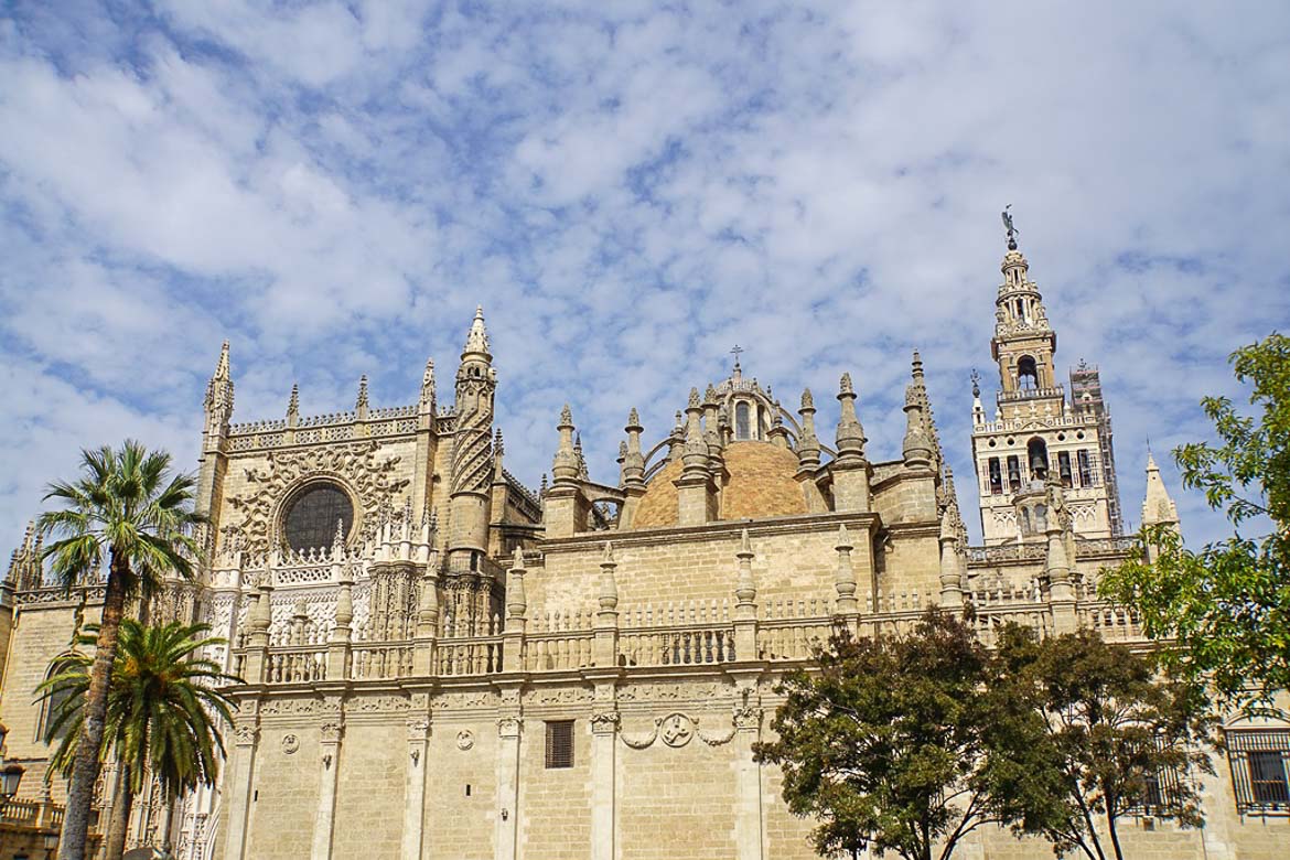 This is a close up of the facade of Seville Cathedral with its ornate decoration.