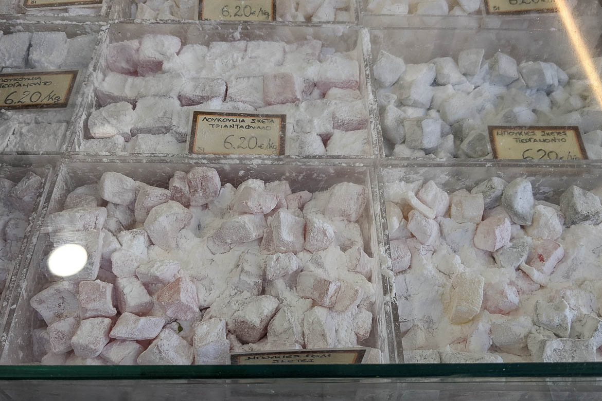 A stall selling different flavours of loukoumi, one of the best things to buy in Greece.