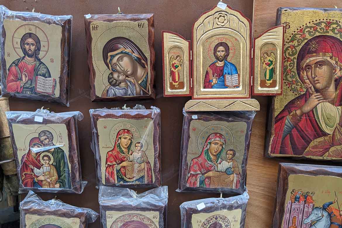Several religious icons of Jesus Christ and the Virgin Mary hanging outside a shop in Plaka.