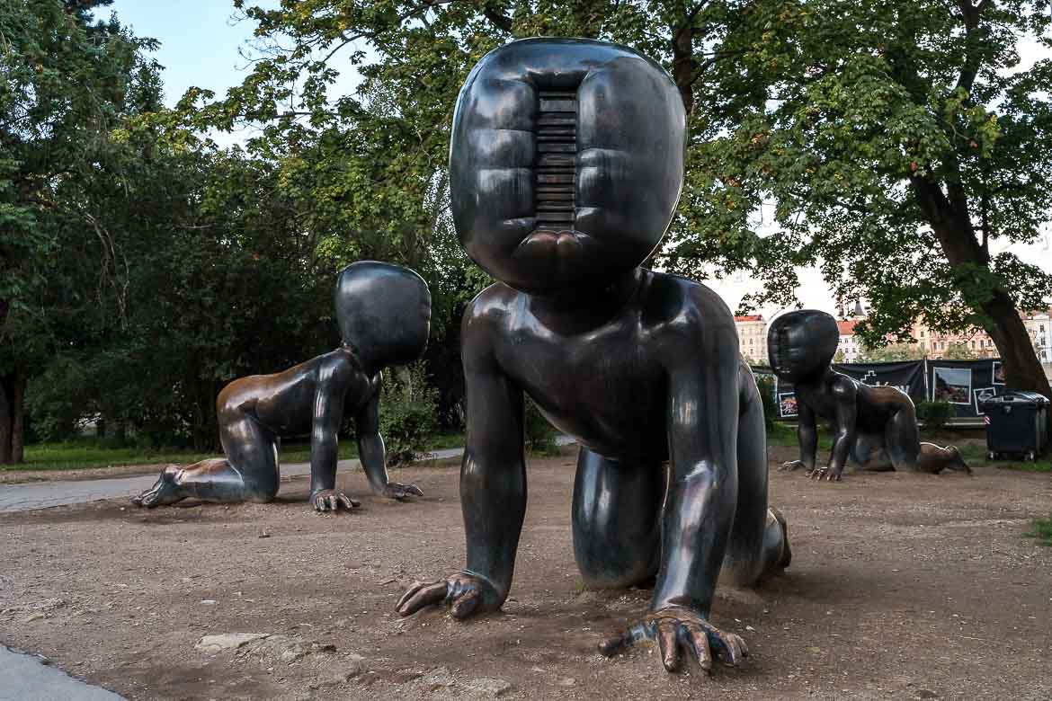 This image shows three enormous baby statues at Kampa Park.
