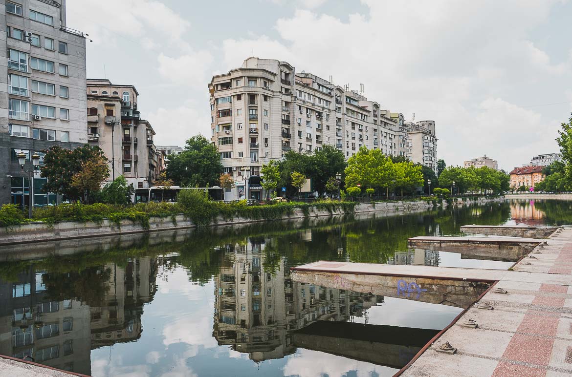 This is a photo of the Dambovita river that flows through Bucharest, Romania. Top things to do in Bucharest.