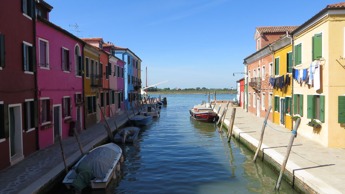 This photo shows Fondamenta Pontinello in Burano, Veneto, Italy. Venice islands the perfect Venice day trip.
