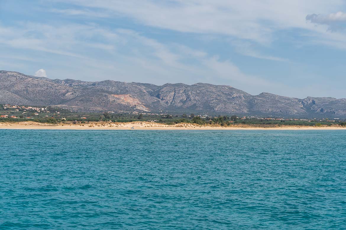 This is a panoramic shot of Pavlopetri Beach as seen from the ferry to Elafonisos Greece. 