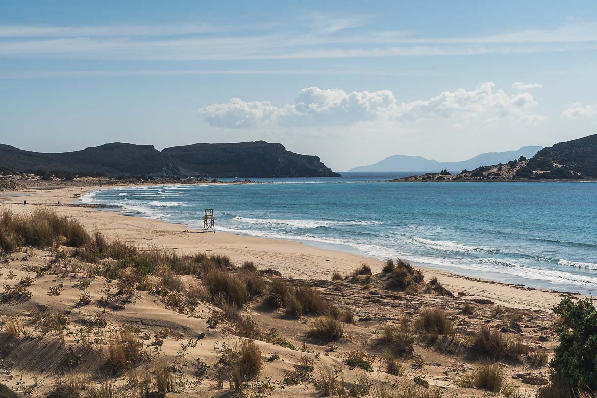 This is a panoramic shot of Megalos Simos Beach with its dunes on a windy day. 