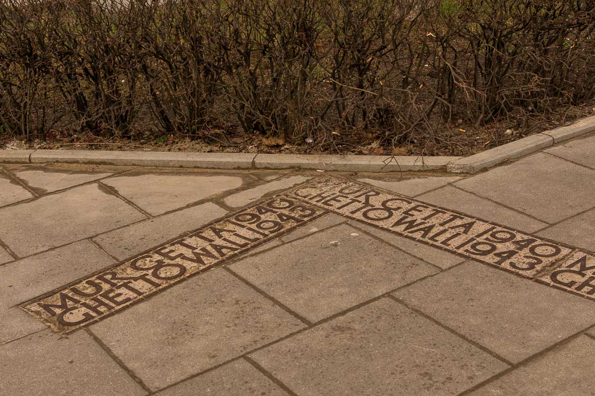 The Warsaw Ghetto boundary marker on Świętojerska Street.