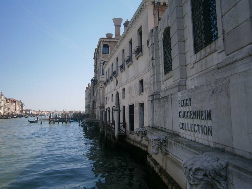 This photo shows the Grand Canal as seen from the Peggy Guggenheim Collection terrace in Venice, Italy. What to do in Venice: our complete guide to La Serenissima.