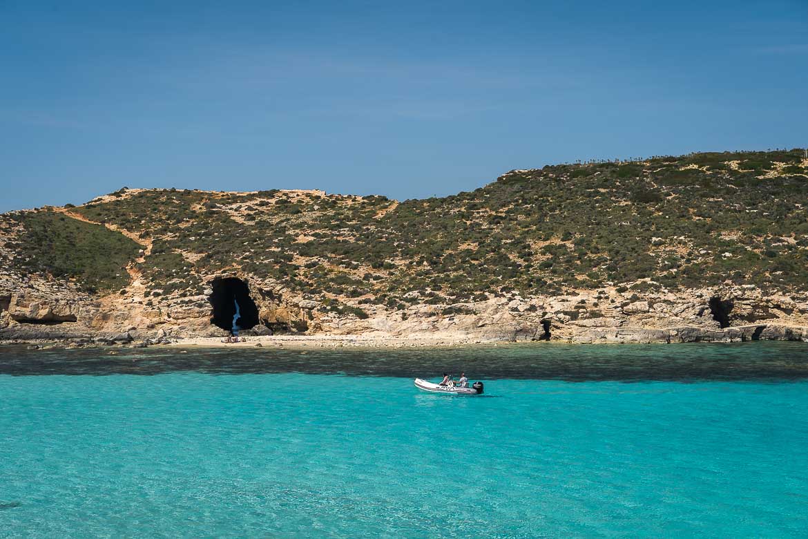 This image shows a small boat on a private tour at the Blue Lagoon.