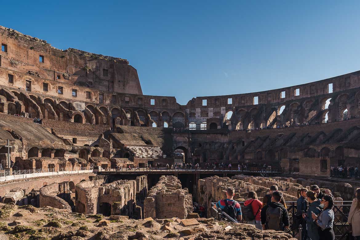 A group of visitors on the ground floor in front of the hypogeum.