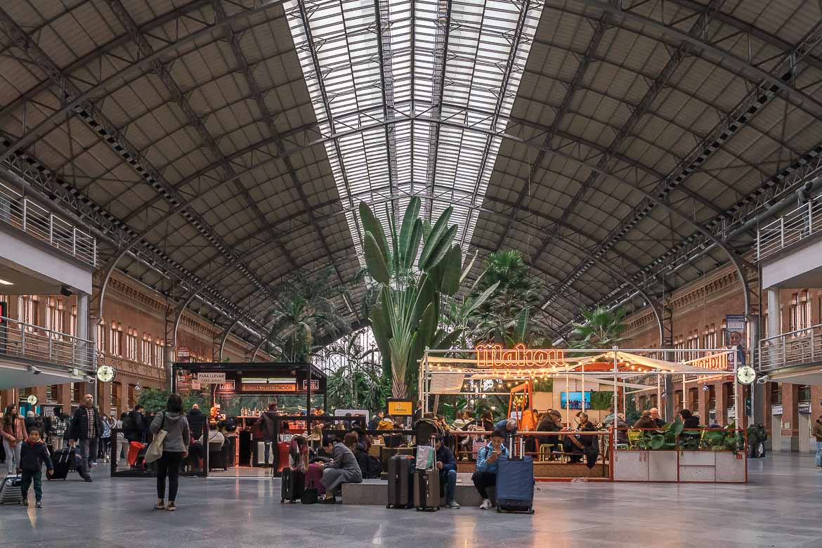 This image shows the interior of the Atocha train station.