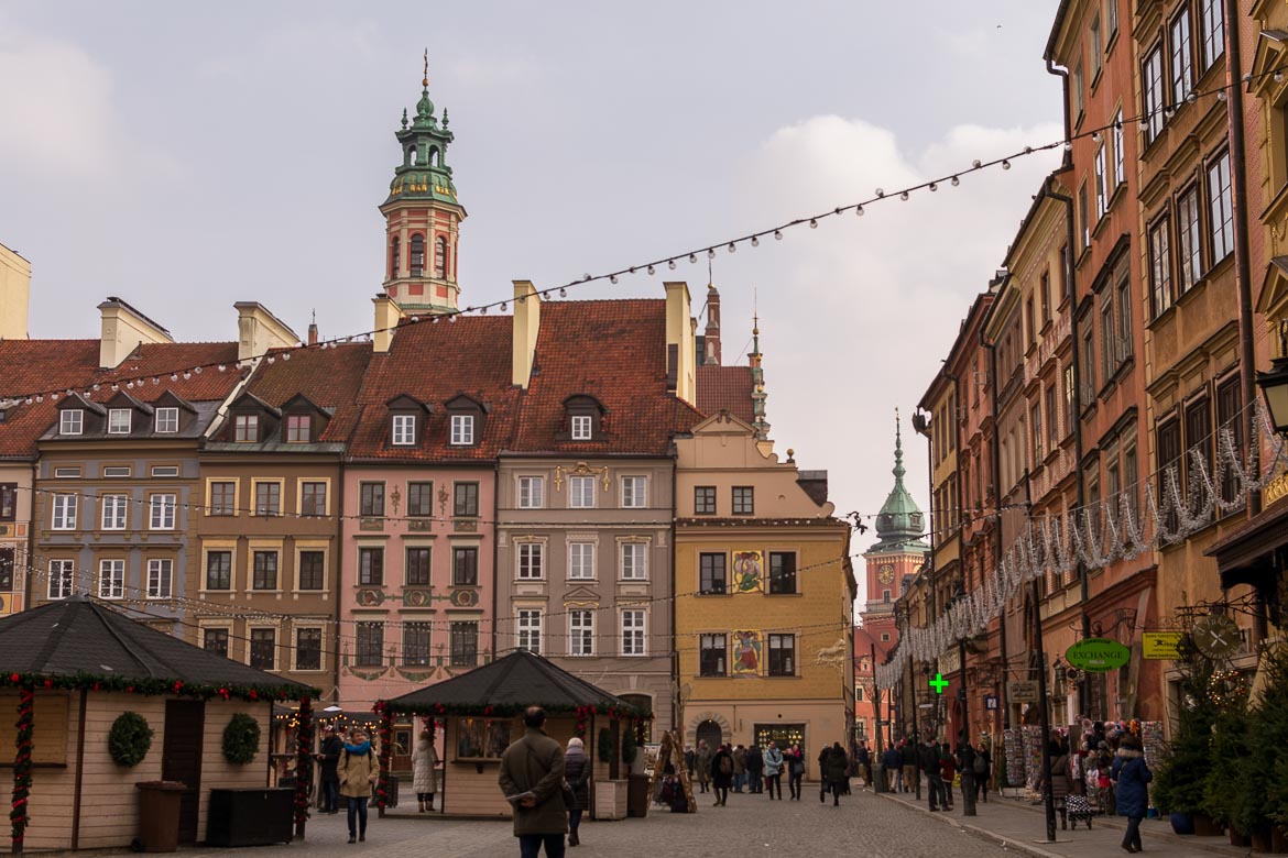 Christmas kiosks in the Old Town Square, which is lined with beautiful colourful buildings.
