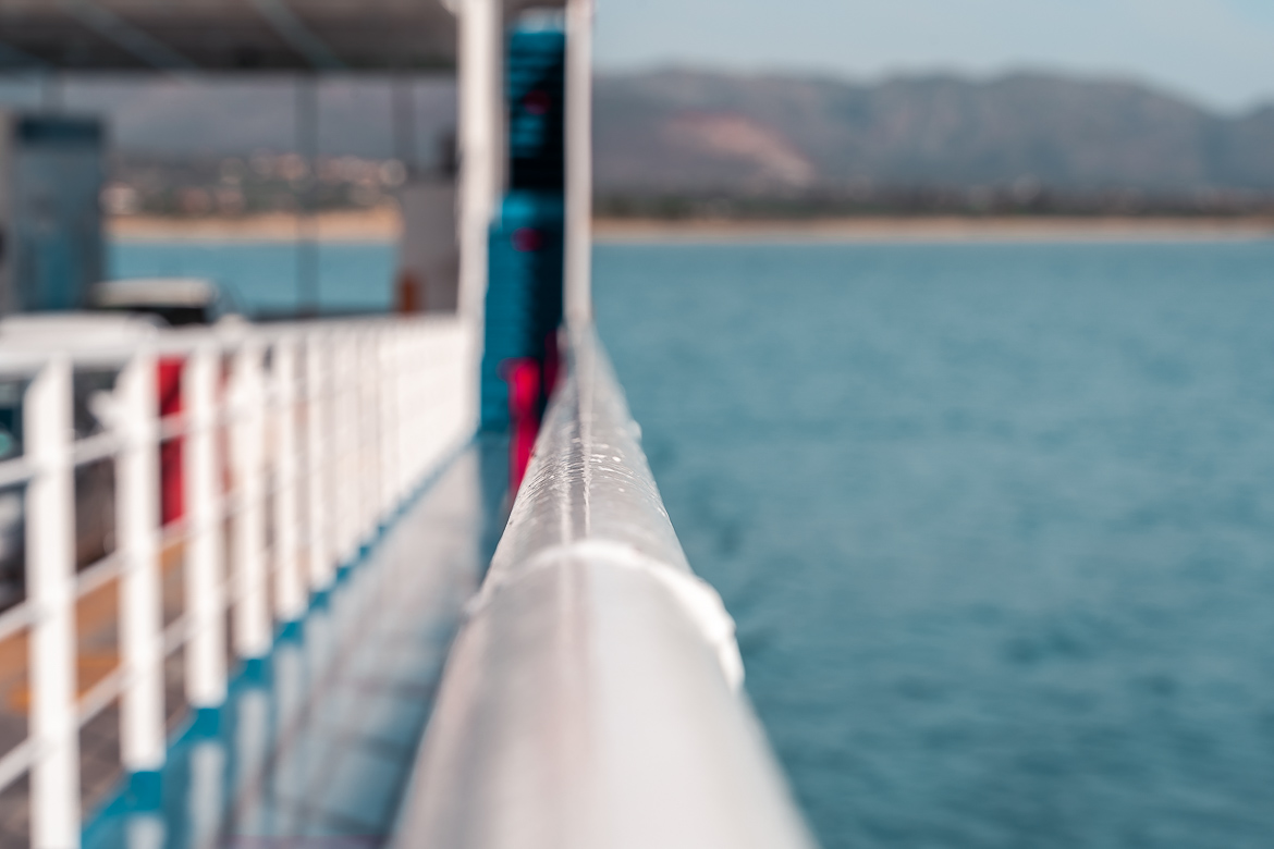 This is a close-up of the rail of a ferry.