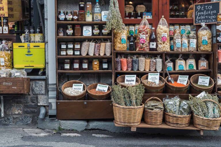 This image shows the storefront of a shop with Greek local products.