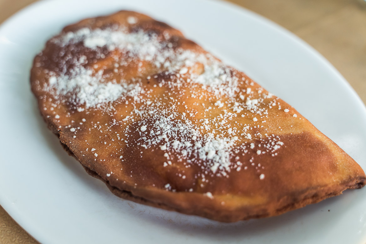This image shows a traditional Greek cheese pie.