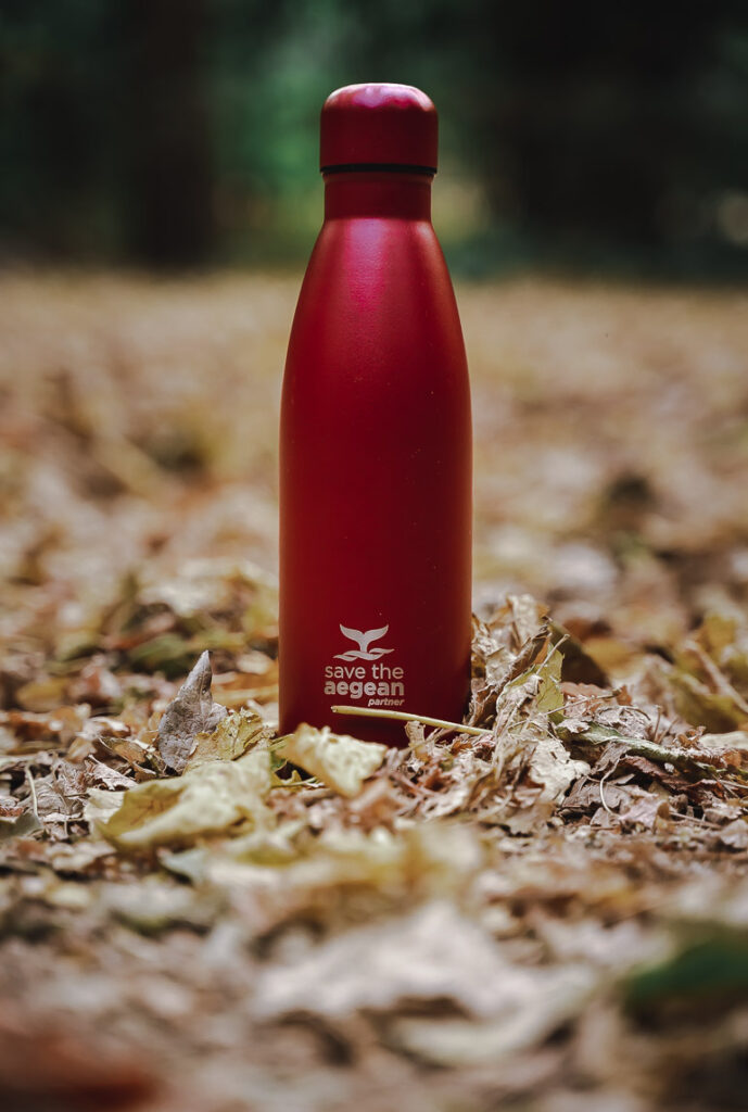 This image shows a red thermal bottle.