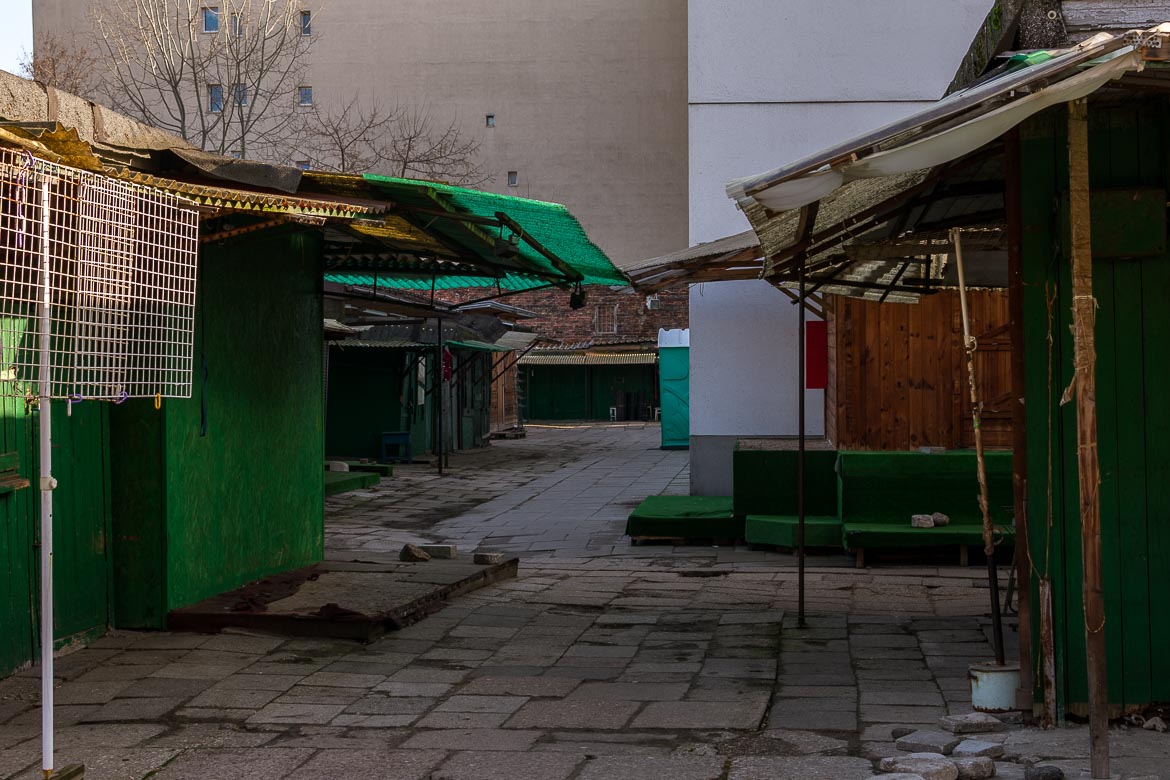 This image shows several market stalls and huts.