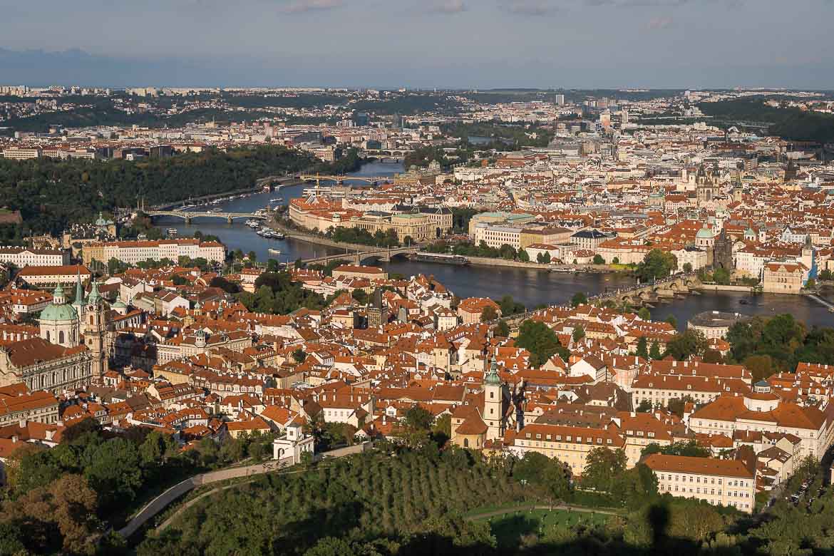 This image shows a panoramic view of Prague from Petrin Tower.