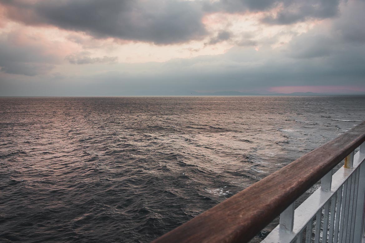 This photo shows the sunset at sea taken from the ferry on our way to the Andros hiking festival in October 2018.