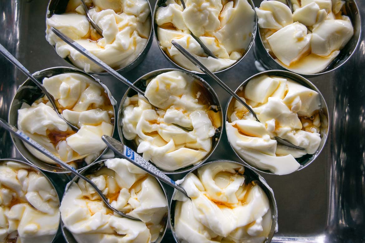 Nine bowls of curd and treacle. 