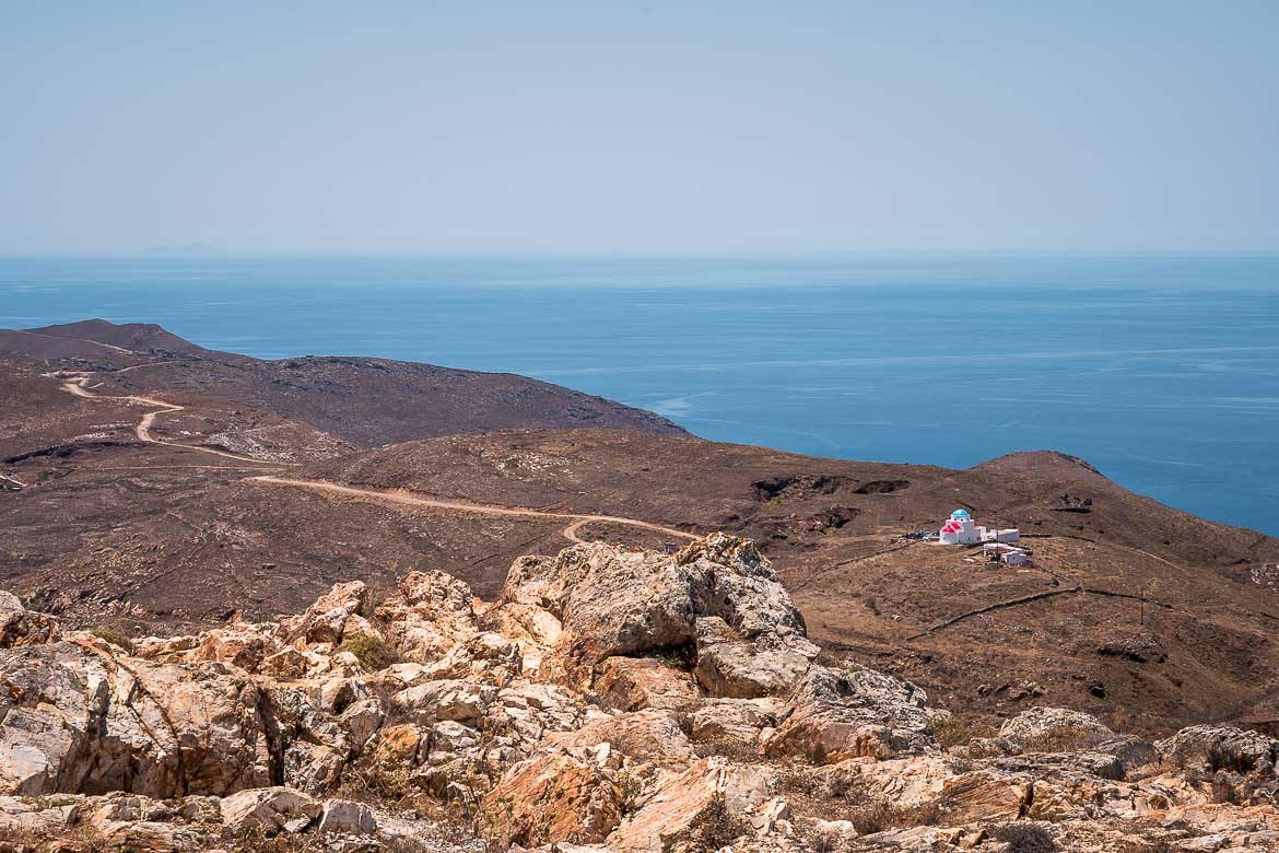 This is a panoramic shot of the barren scenery of Serifos. You can see the church of Agia Triada in the distance.