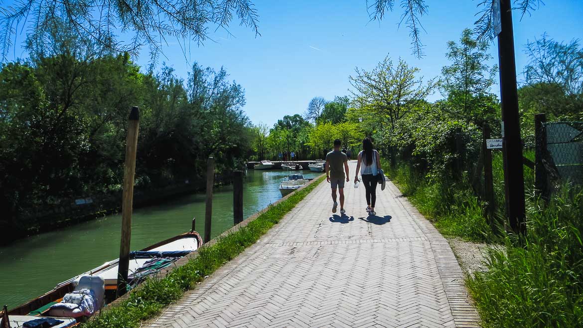 This is a photo of the single walkway in Torcello, Veneto, Italy. Venice Islands: The perfect Venice day trip.
