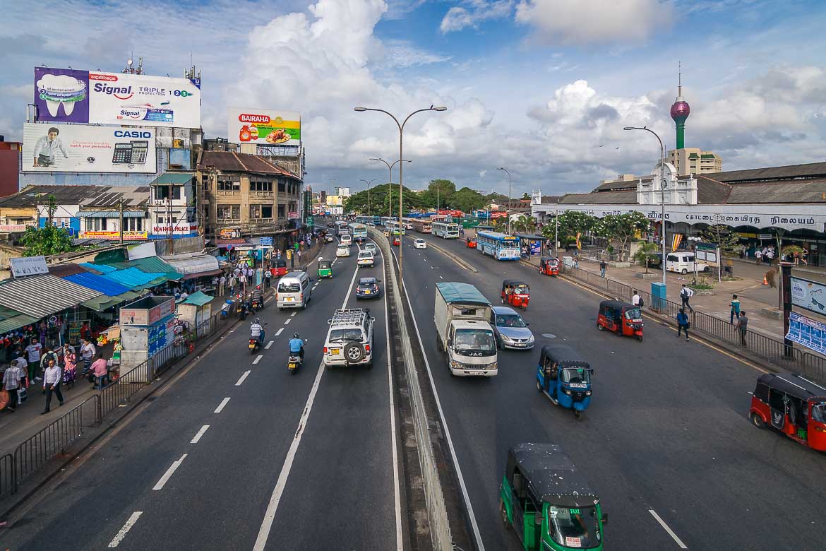 Panoramic view of a main road in Colombo. The Lotus Tower is in the background.