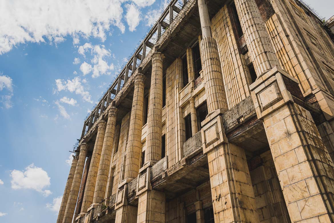 This photo shows the unfinished Romanian Academy we saw during our Bucharest walking tour of Communism in Romania.