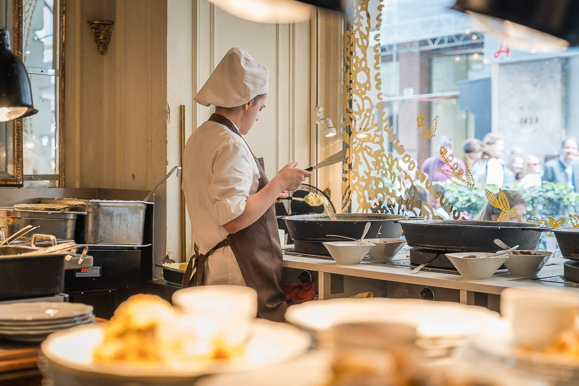 A woman prepares the dough for Kaiserschmarrn at Demel café. If you're seeing Vienna in 3 days, you have to try this delicious dessert. 
