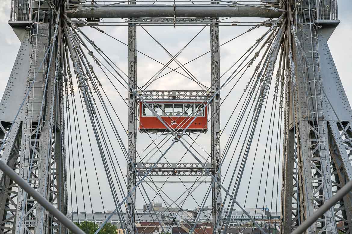 A retro red wagon of the Ferris Wheel at the Prater.