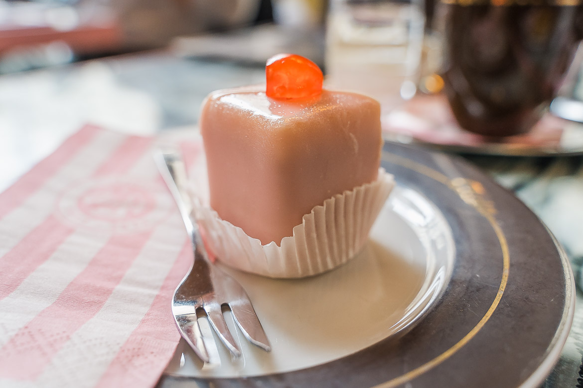 The traditional pink Viennese cake called Punschkrapfen at AIDA café.
