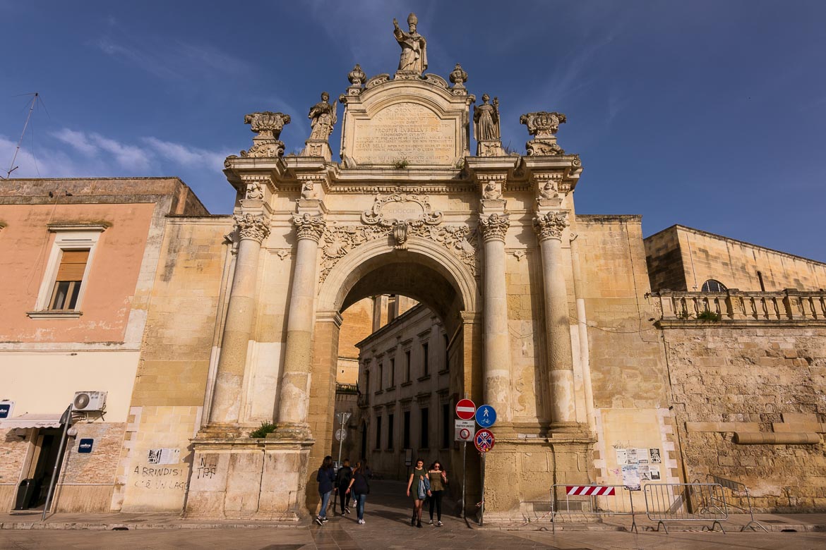 This is a photo of Porta Rudiae. Wondering what to do in Lecce? Checking out all three of the old city gates is definitely one of the best things to do in Lecce. 