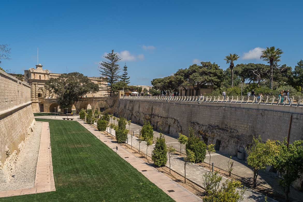 Panoramic view of the moat with the main gate and its bridge in the background.