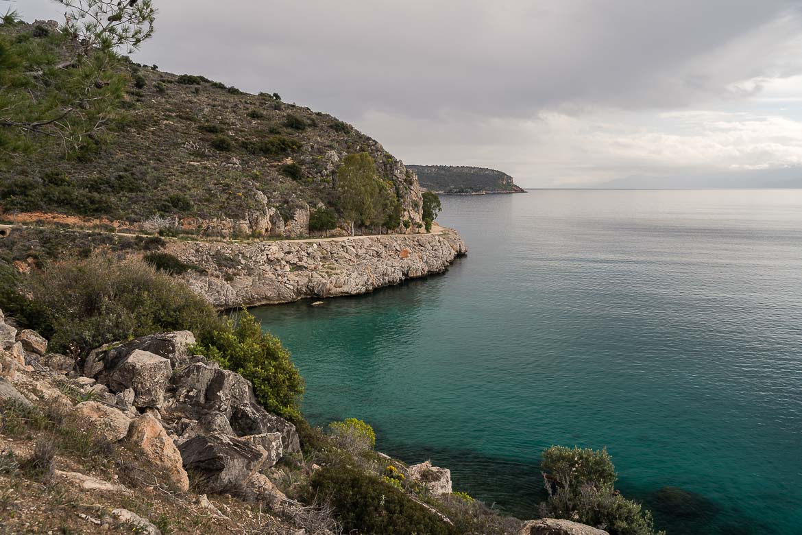 This image shows a panoramic view of the seaside trail that leads to Karathona Beach.