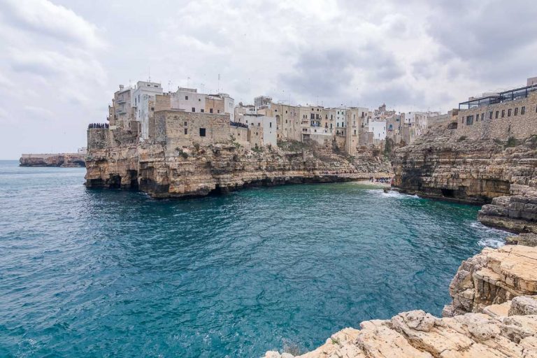 This is a panoramic view of Polignano a Mare from Petra Piatta. This is our favourite view of the town. This is why we chose this photo as the featured image of our article: What to do in Polignano a Mare Italy in one day.