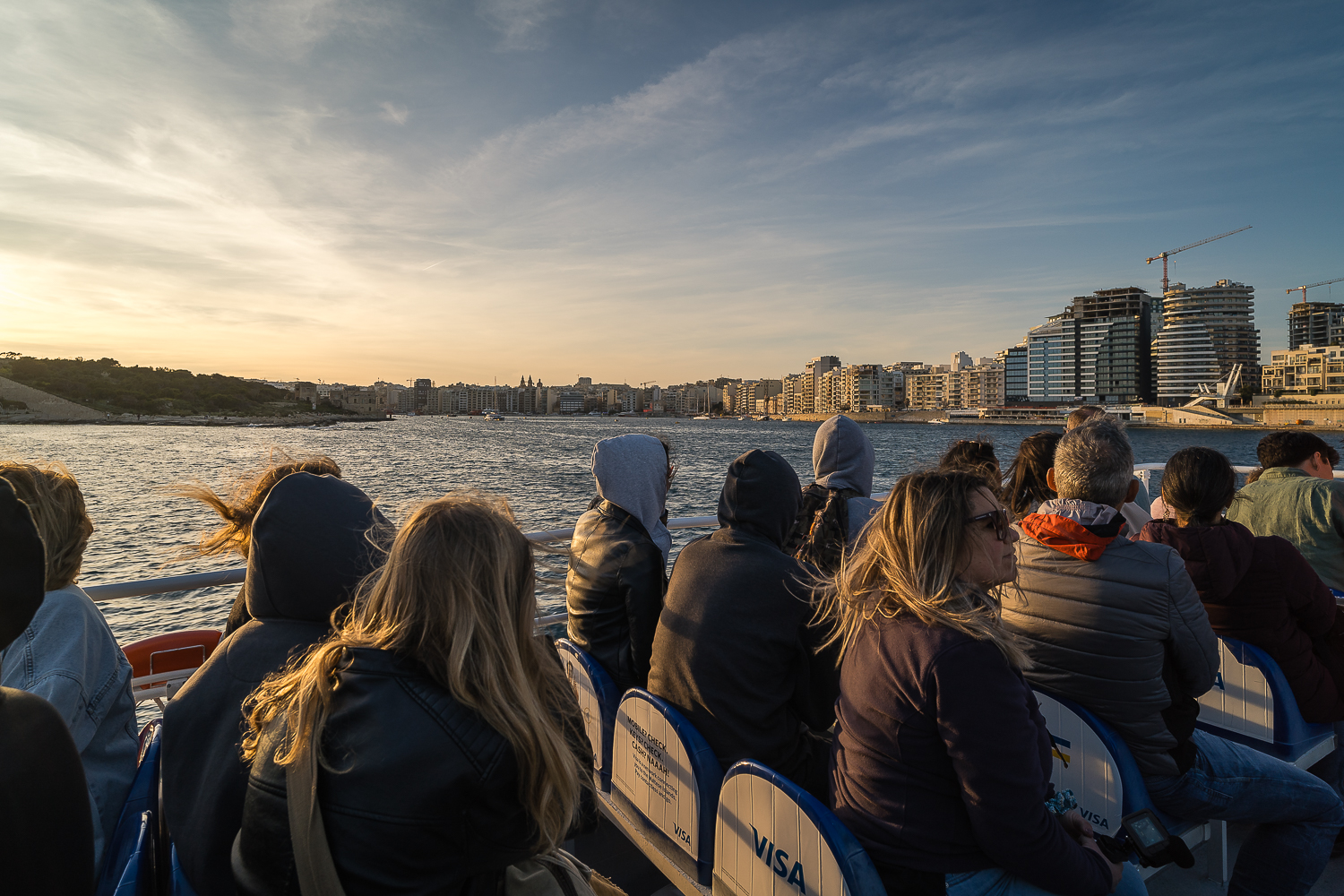Passengers on the ferry's deck from Valletta to Sliema.
