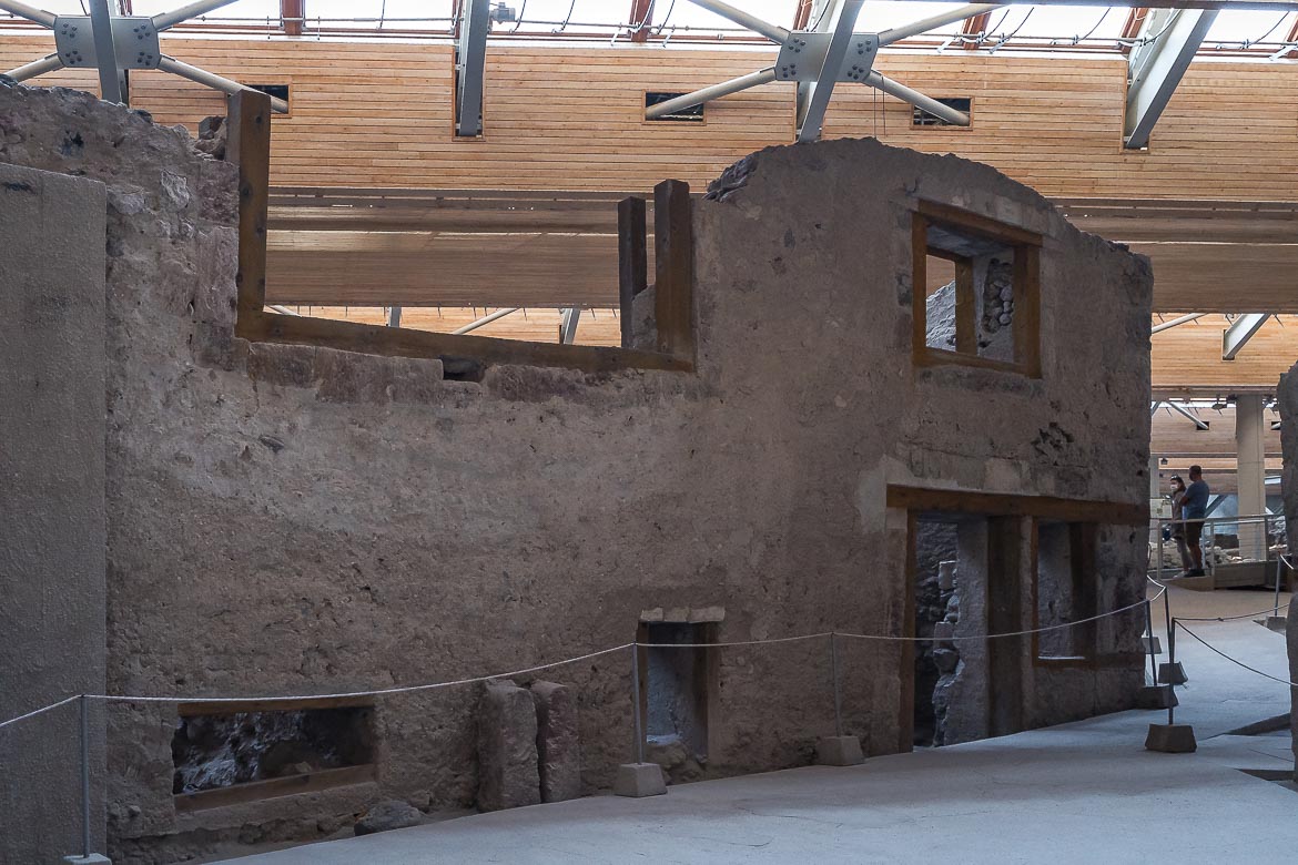 The remaining facade of a two-storey house in the archaeological site of Akrotiri.