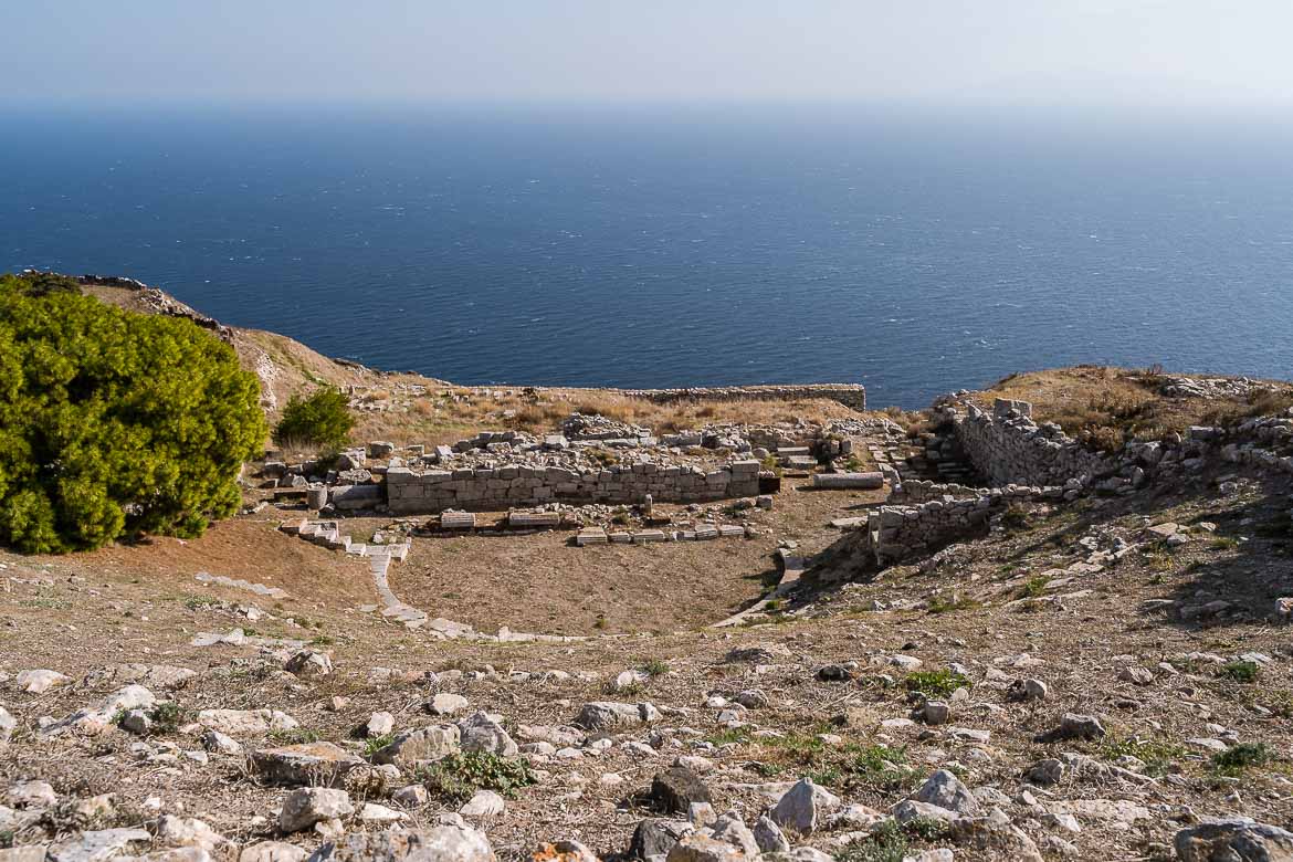 This image shows the theatre of Ancient Thera. In the background, the Aegean Sea.