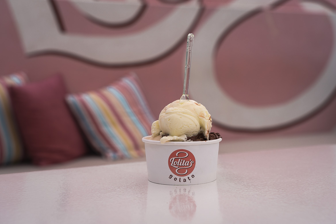 This is a close-up of a paper cup filled with delicious Lolita's Gelato in Oia.